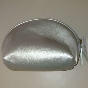 Gold colored makeup bag